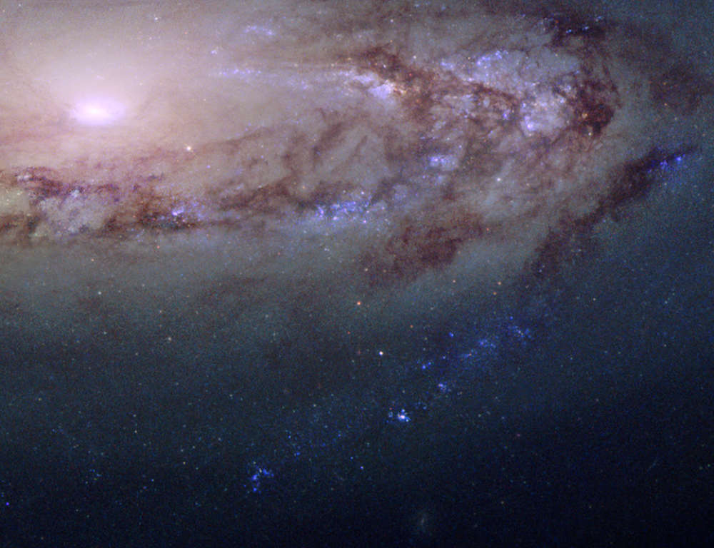 Esta brilhante e bela galáxia espiral é chamada M90.
